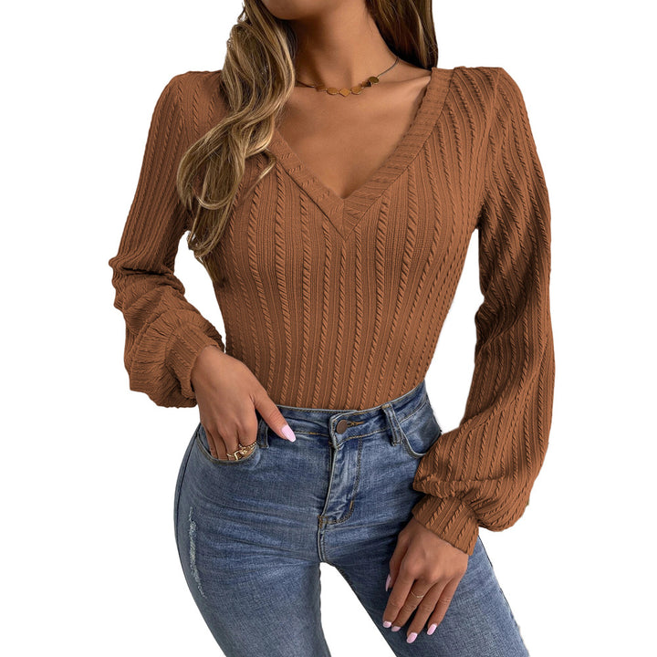 Kvinders strikket bodysuit med V-hals og elegante puffærmer Stilla
