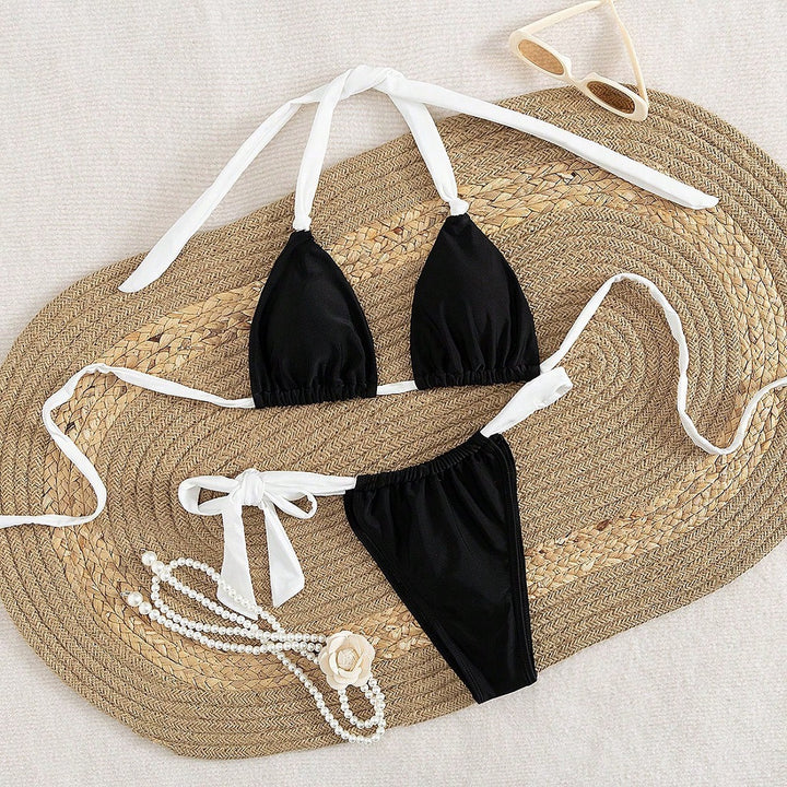 Dame triangel-bikini med justerbare stropper og feminint bindedetalje Skovae