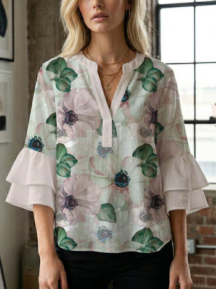 Dame skjorte med voluminøse ærmer og blomsterdesign Skovae