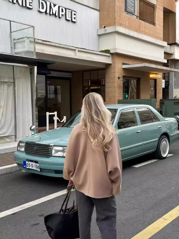 Dame Oversized Uldjakke med store lommer og elegant Replay Stilla
