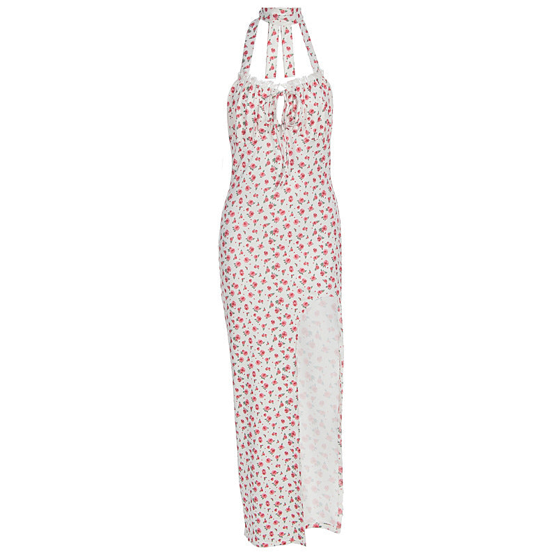 Dame maxikjole med blomsterprint, halterneck og asymmetrisk kant Skovae