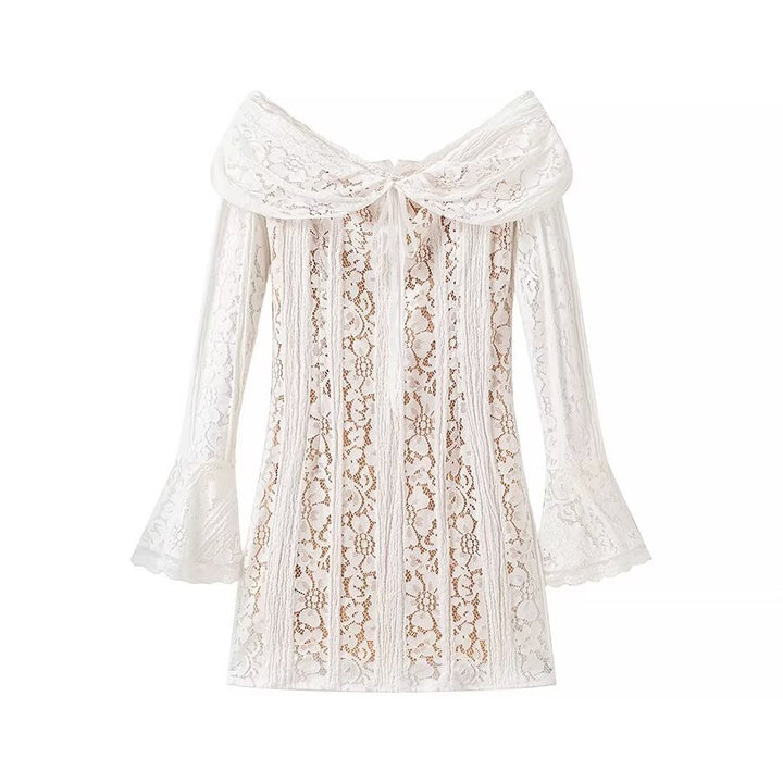 Dame spidsbluse med off shoulder design og elegante klokkeærmer Stilla