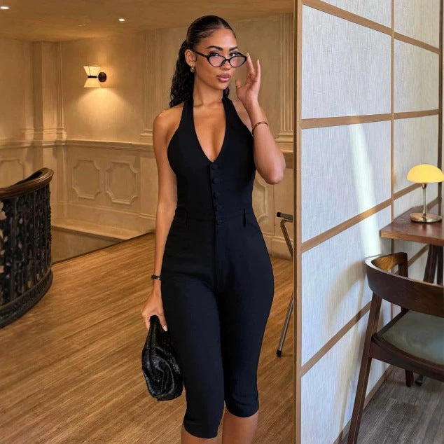 Dame jumpsuit med dyb V-udskæring og elegant knapdetalje Skovae