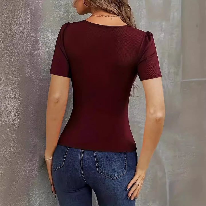 Dame tætsiddende bodysuit med dyb V-udskæring og korte ærmer Stilla