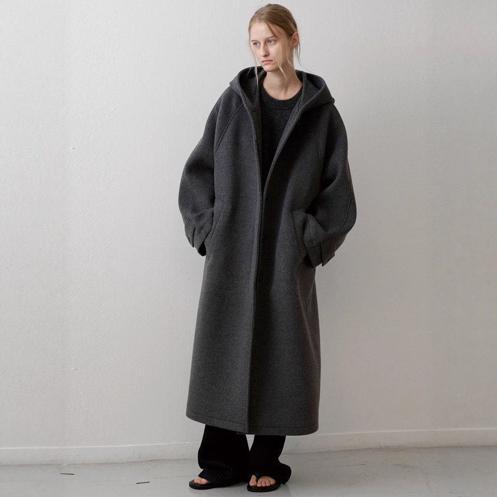 Kvinders elegante oversized jakke med hætte og praktiske lommer Stilla