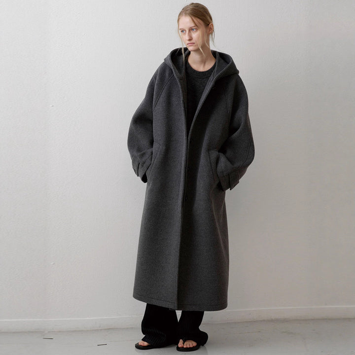 Kvinders elegante oversized jakke med hætte og praktiske lommer Stilla