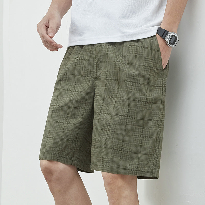 Herrer afslappede plaid shorts med elastisk linning og praktiske sidelommer Stilla