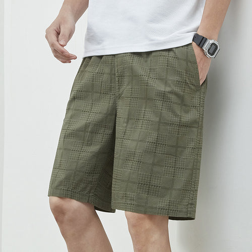 Herrer afslappede plaid shorts med elastisk linning og praktiske sidelommer Stilla