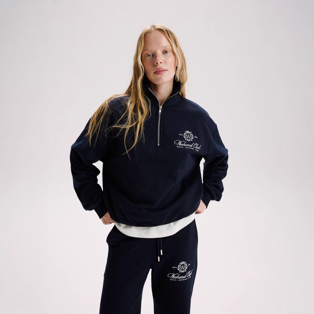 Kvindernes sporty zip-pullover med en afslappet pasform og elegant broderi Stilla
