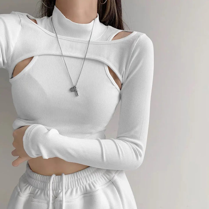 Dame trendy top med cut-outs og høj krave Skovae