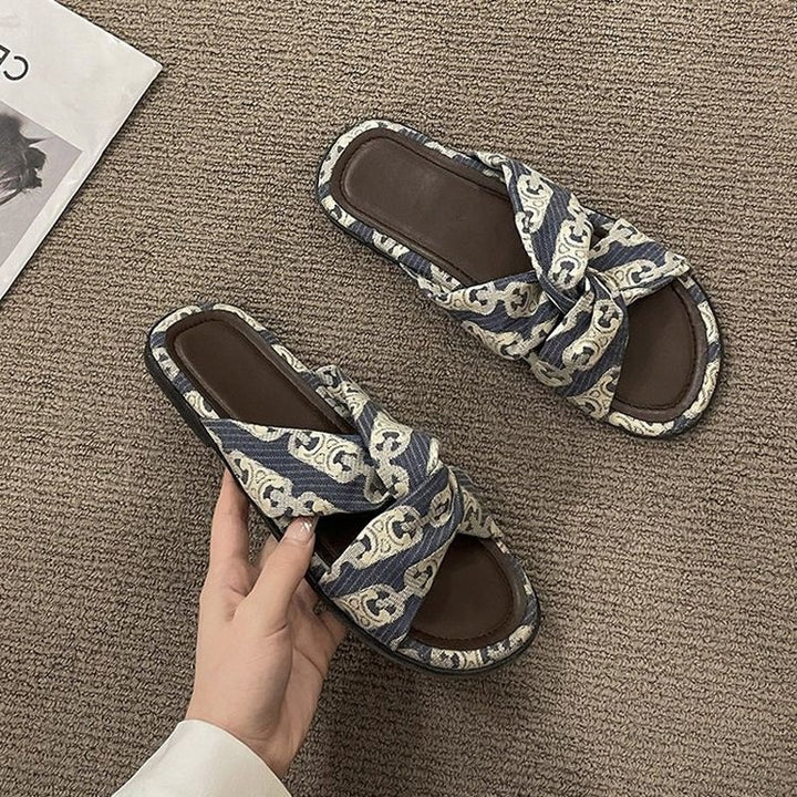 Dame slippers med moderne knude-design og komfortabel sål Stilla