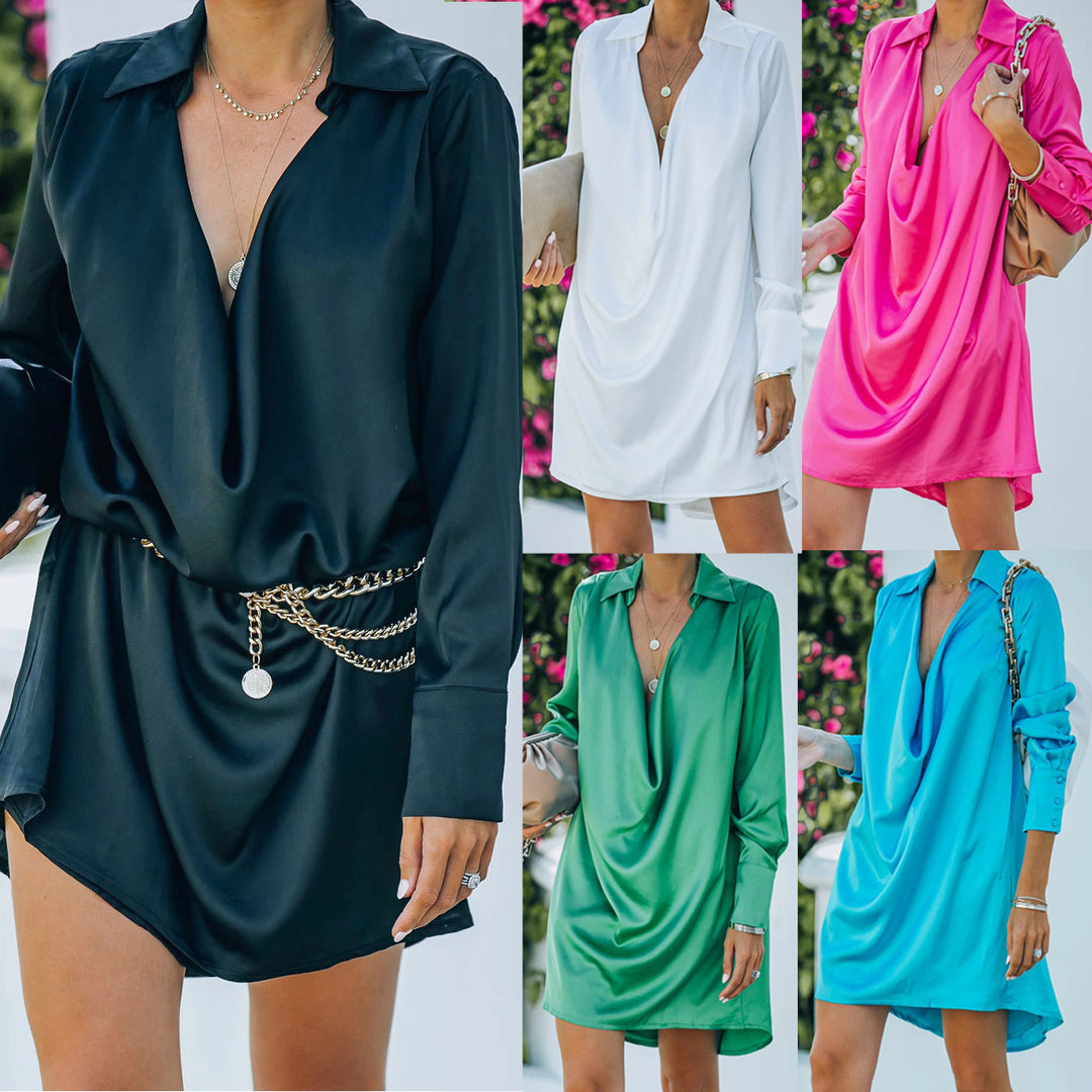 Dame indhyllet kjole med dyb V-hals og elegant drapering Stiila