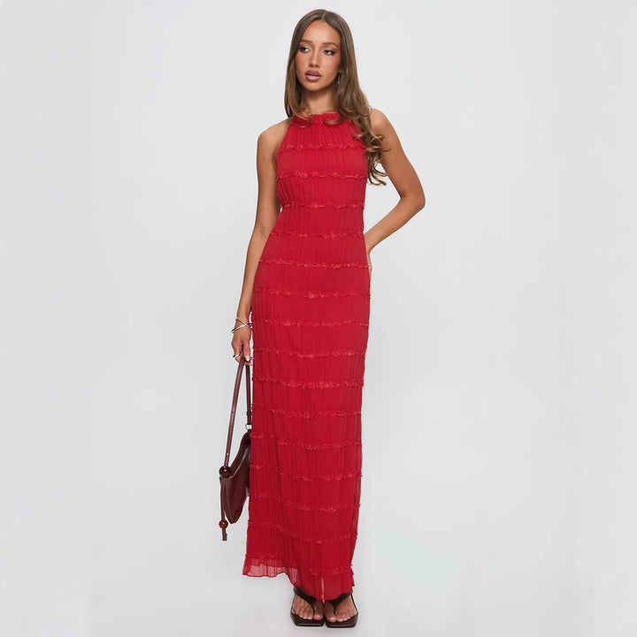 Dame maxikjole med off-the-shoulder design og flydende flæser Skovae
