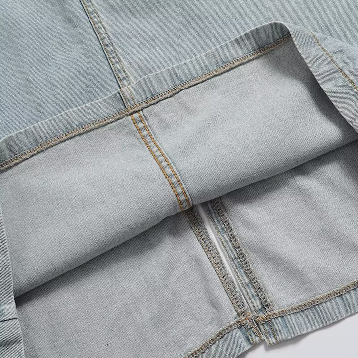Dame jumperkjole lavet af slidstærk denim med praktiske knapdetaljer og vid udskæring Stilla