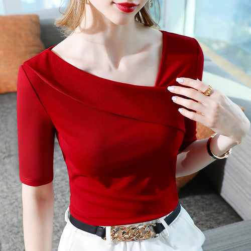 Dame Elegant top med asymmetrisk snit og feminin drapering Stilla