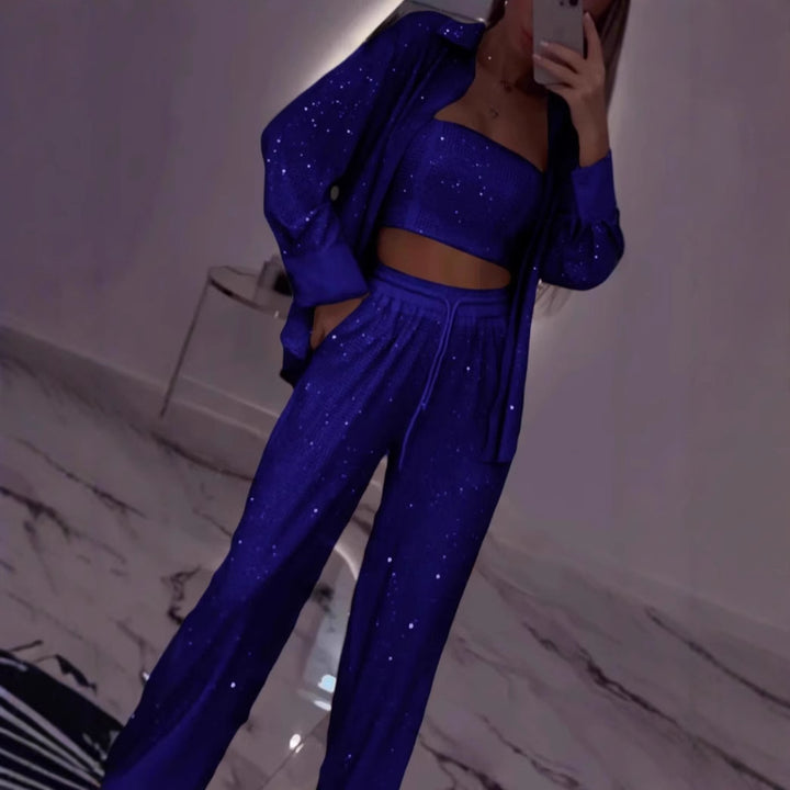 Dame fritids-loungewear sæt med glitrende top og elastiske bukser Stilla