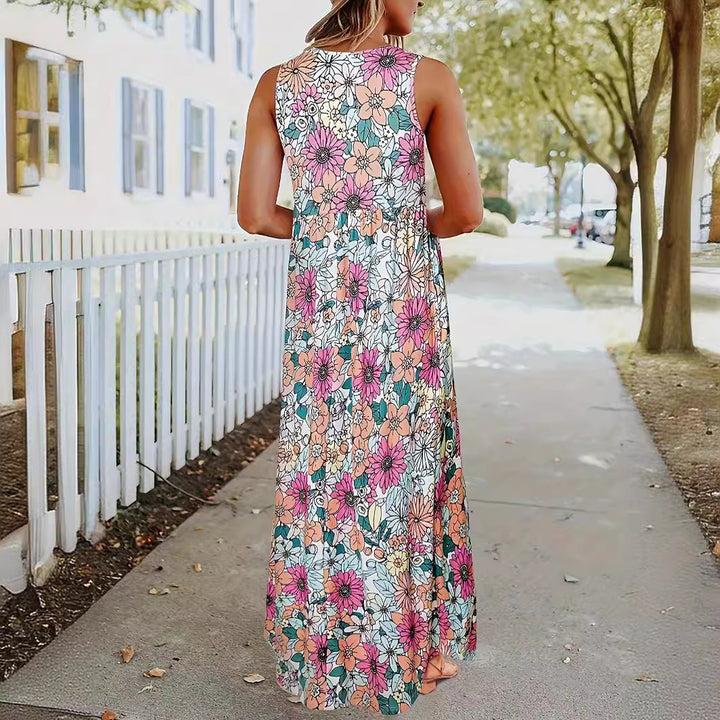 Dame maxikjole med blomsterprint og praktiske lommer Stilla