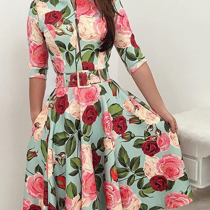 Kvindernes midikjole med blomsterprint og taljebælte Stilla