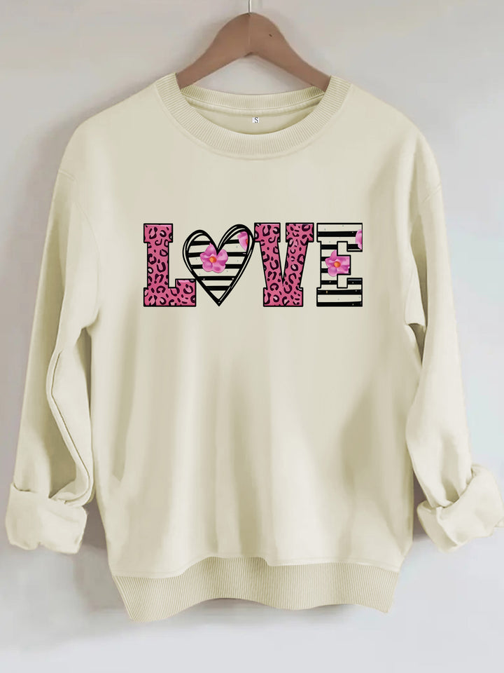 Kvinders sweatshirt med moderne leopard hjerte design og behagelig pasform Stilla