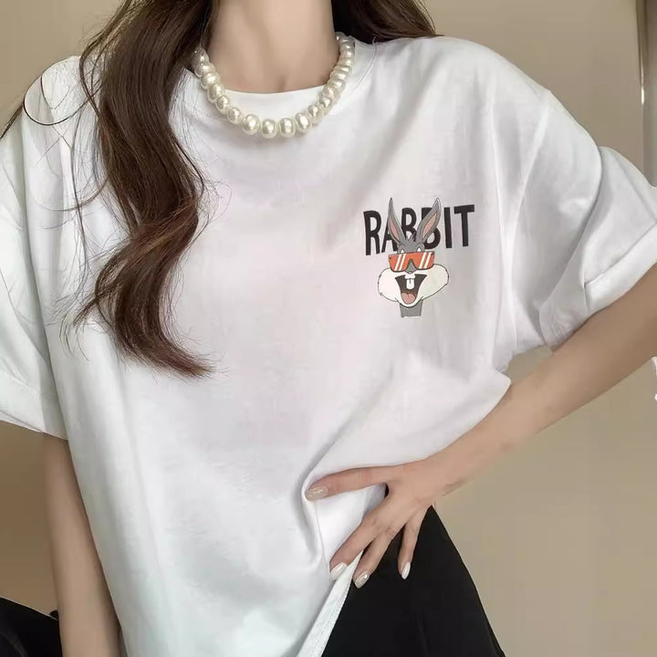 Dame T-shirt med kreativt cartoon-motiv og afslappet pasform Stilla