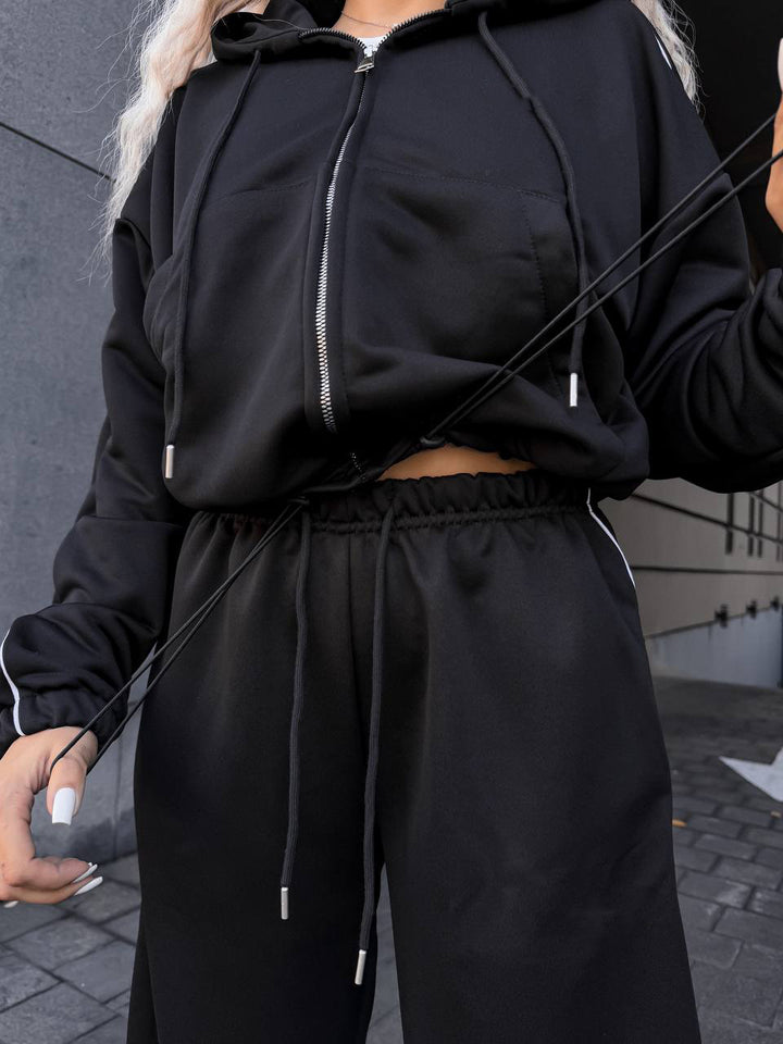 Kvindelig sporty loungewear sæt med hætte og brede bukser Skovae