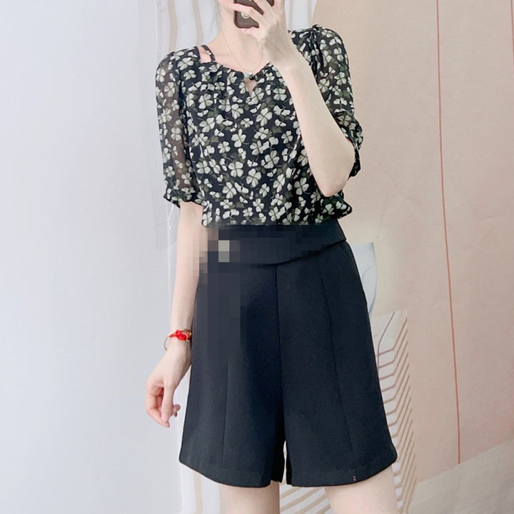 Dame elegante shorts med blomsterprint og figursyet design Stilla
