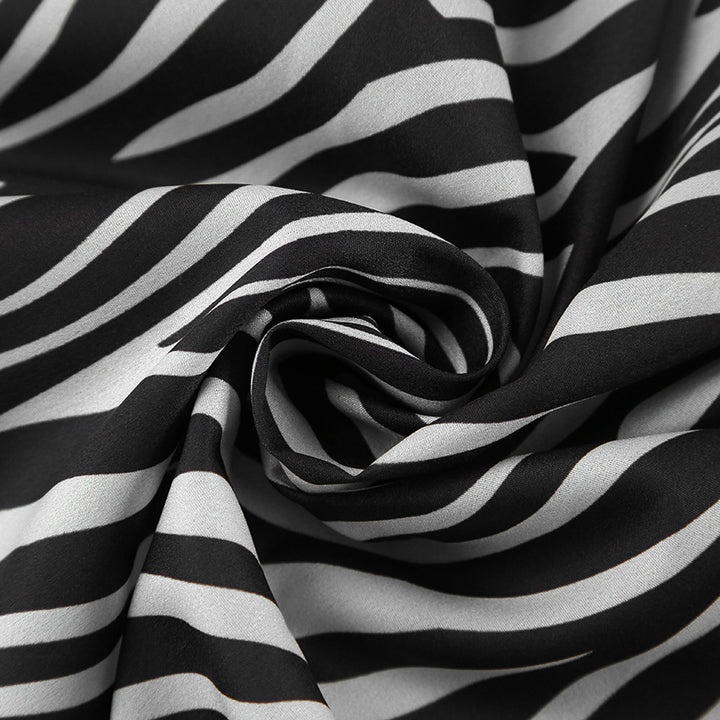 Dame fritidsdragt i moderne zebra-print med løs pasform og elastisk talje Stilla