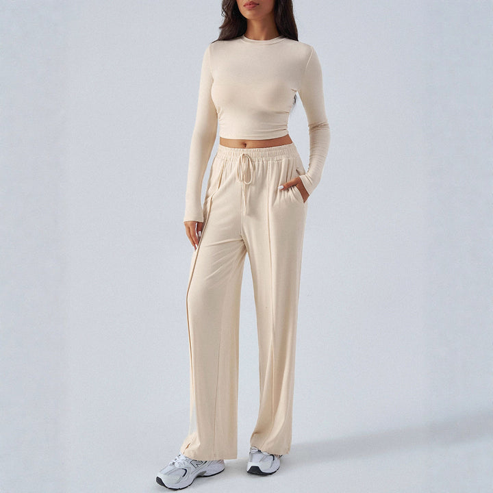 Dame sæt af elastisk crop-top og løstsiddende joggingbukser Stilla
