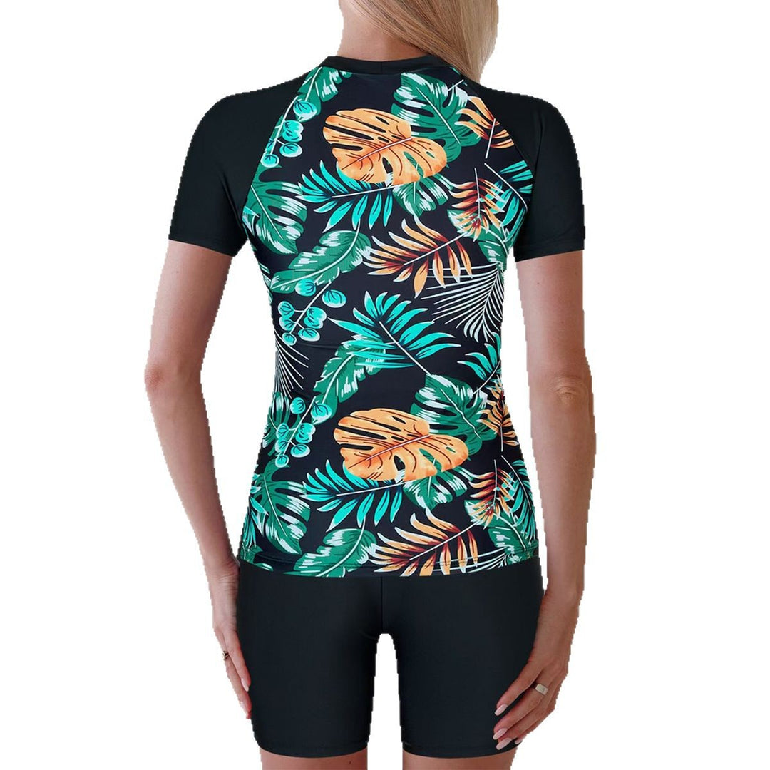 Dame Rashguard-sæt med moderne blomsterdesign og sporty pasform Stilla