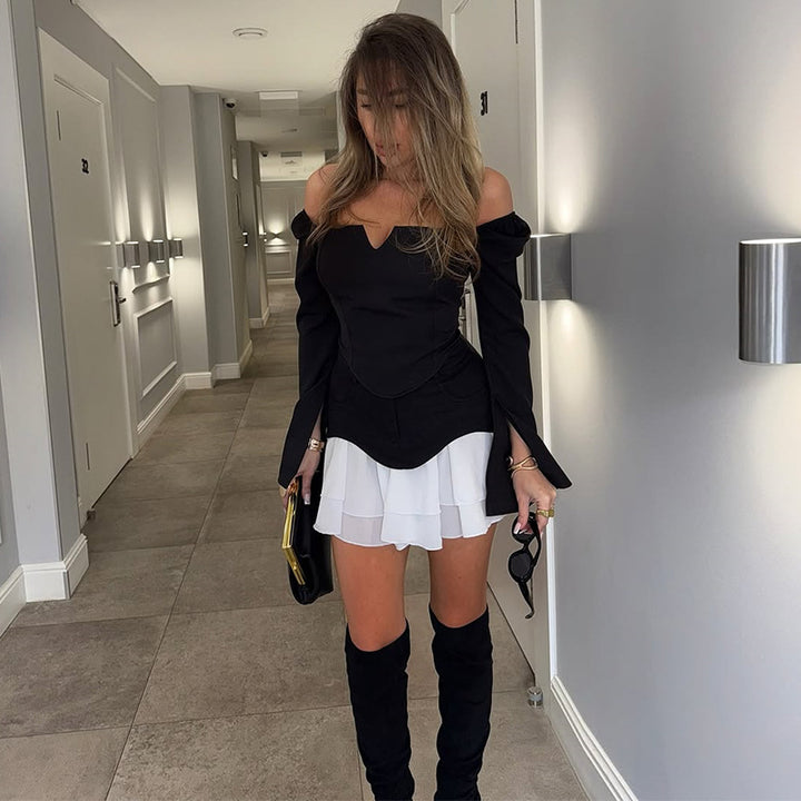 Dame Off-Shoulder Bluse med ruffle detaljer og figurtilpasset snit Stilla