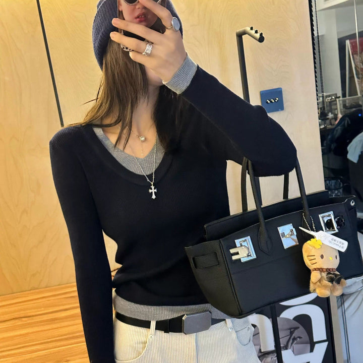 Damer V-hals finstrikket sweater med kontrastmanchetter Stilla