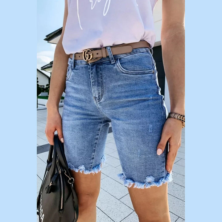 Dame jeans-shorts i moderne relaxed-fit stil med frynsekant Stilla