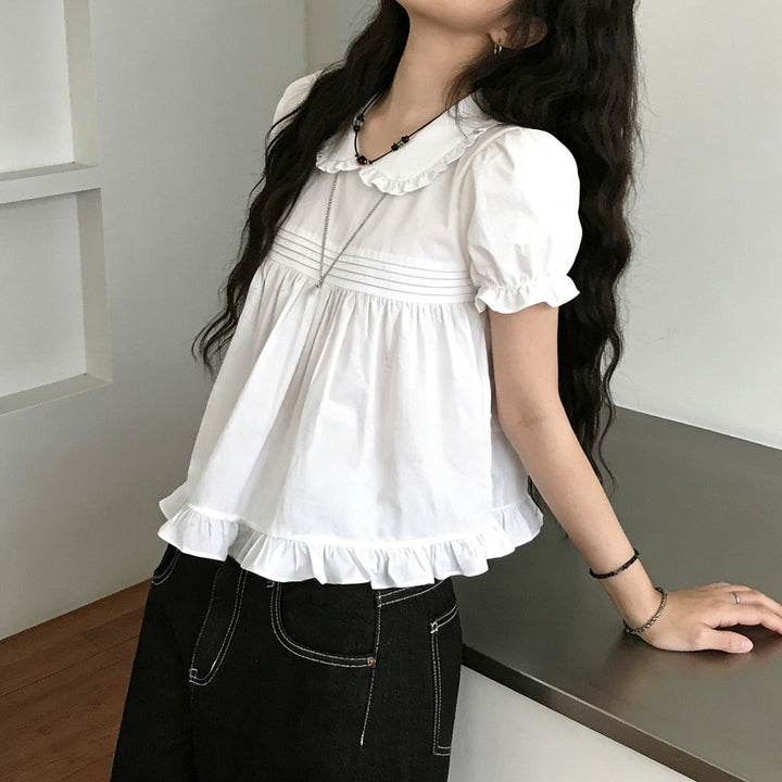 Damebluse med rynker og elegant krave Skovae