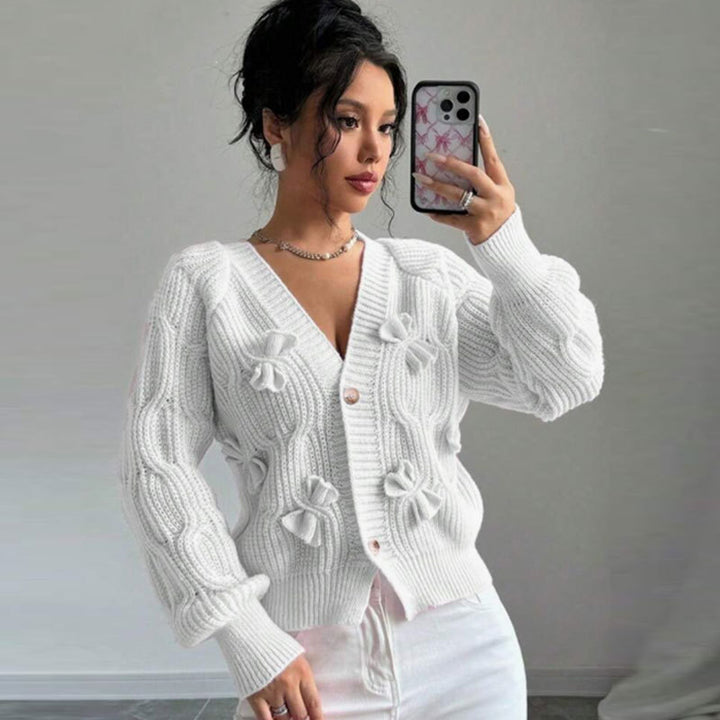 Kvinders cardigan med blomster-reliefdesign og knapbare detaljer Stilla