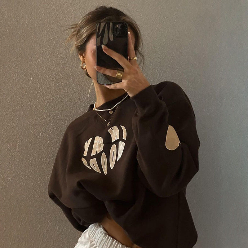 Dame Sweatshirt med moderne skrift og afslappet snit Stilla