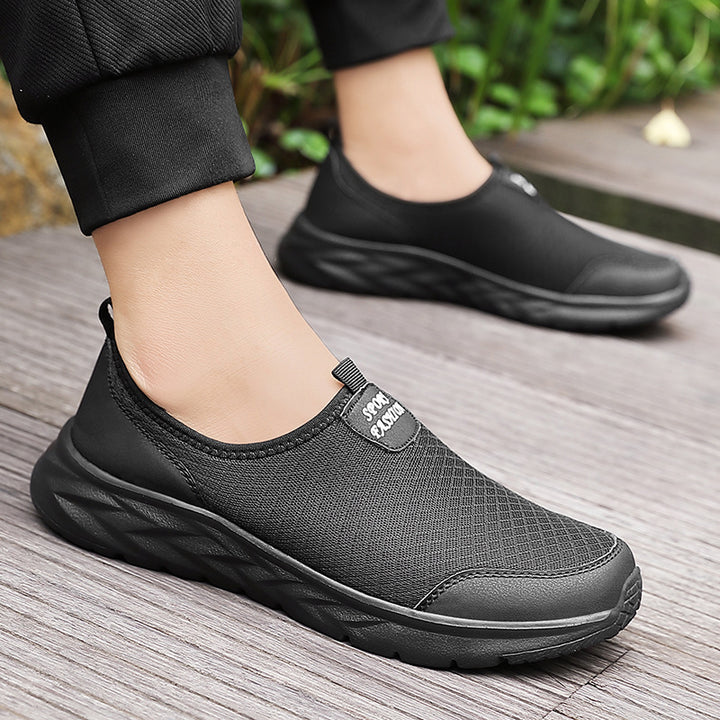 Herrer Slip-On Sportsneaker med åndbart mesh-design Stilla