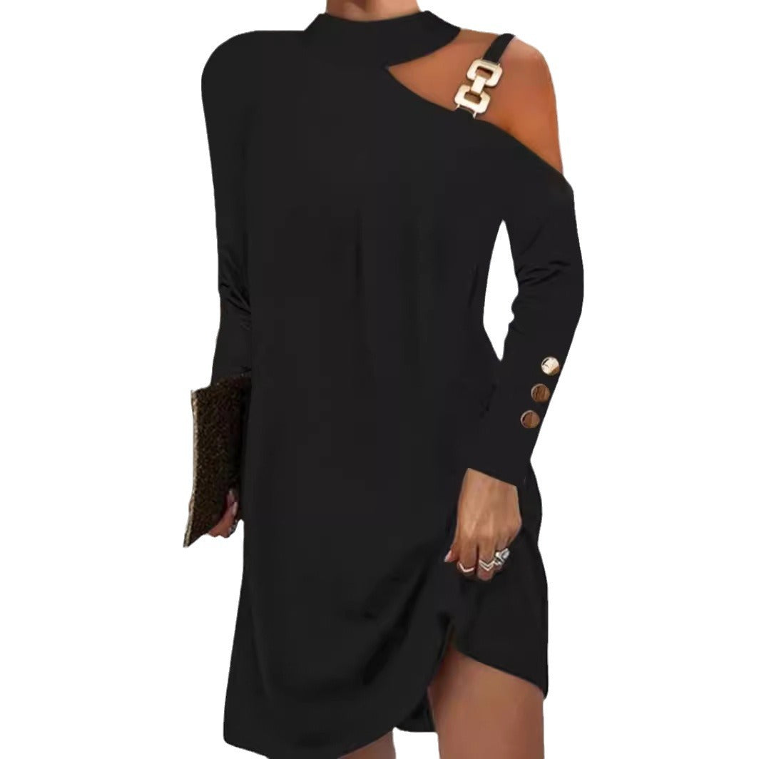 Damekjole med moderne cut-out-detaljer og elegante knapapplikationer Stilla
