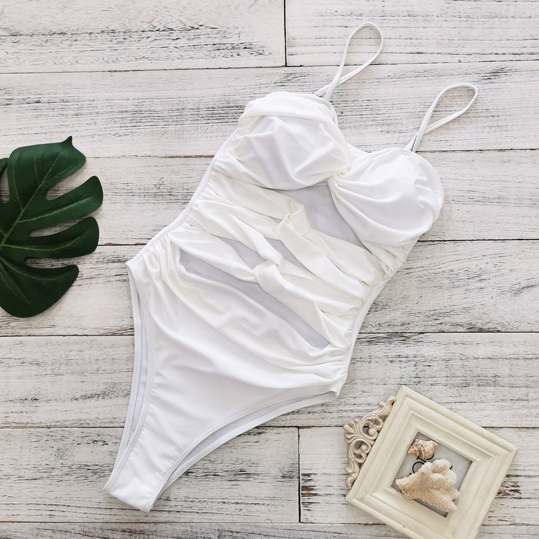 Dame enpiece badedragt med raffineret indpakningsdesign og figursyende cut-out-detaljer Stilla