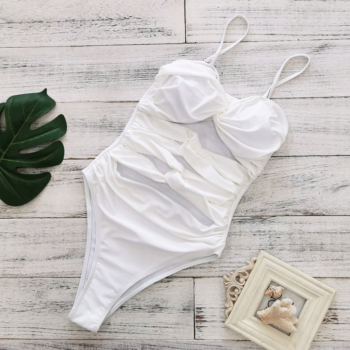 Dame enpiece badedragt med raffineret indpakningsdesign og figursyende cut-out-detaljer Stilla