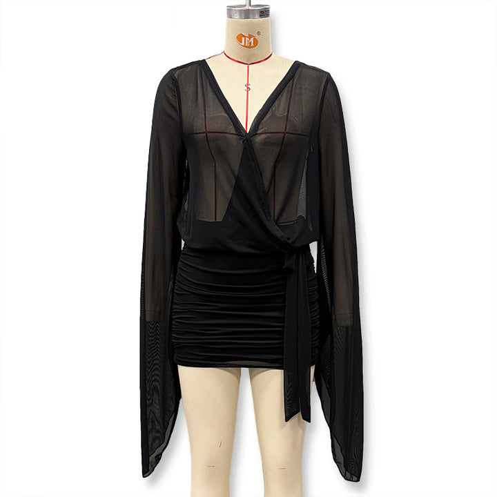 Dame indpakningsbluse med transparente ærmer og figurskabende design Skovae