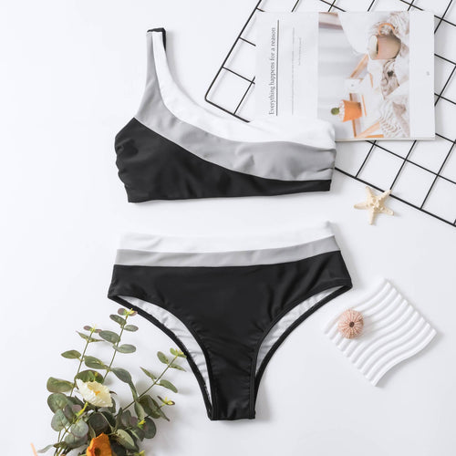 Dame bikini-sæt med asymmetrisk top og moderne farveblokdetaljer Stilla