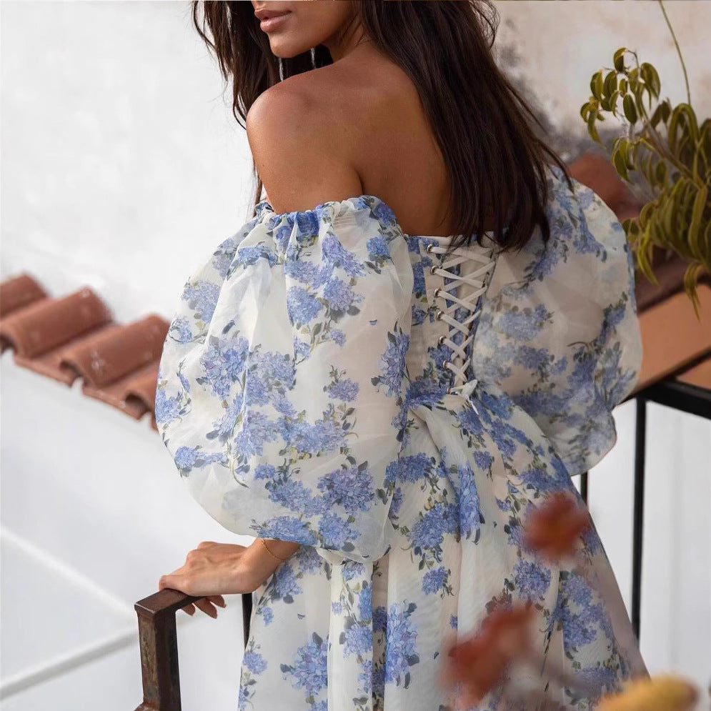 Dame blomsterkjole med puffærmer og transparente indsatser Stilla