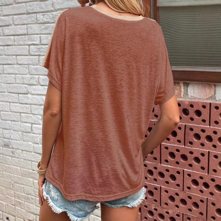 Dame afslappet top med asymmetrisk snit og one-shoulder detalje Stilla