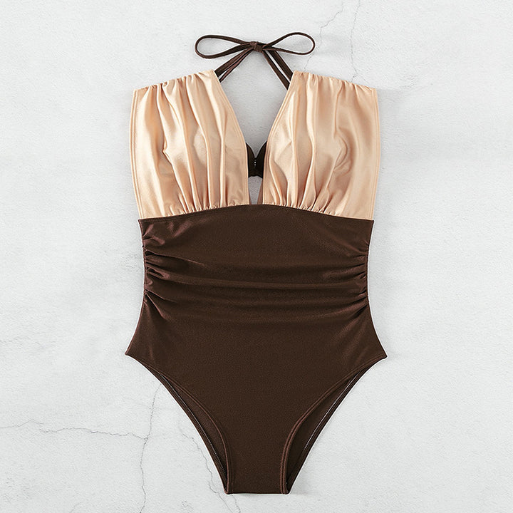 Dame one-piece badedragt med dyb V-hals og moderigtig cut-out Skovae