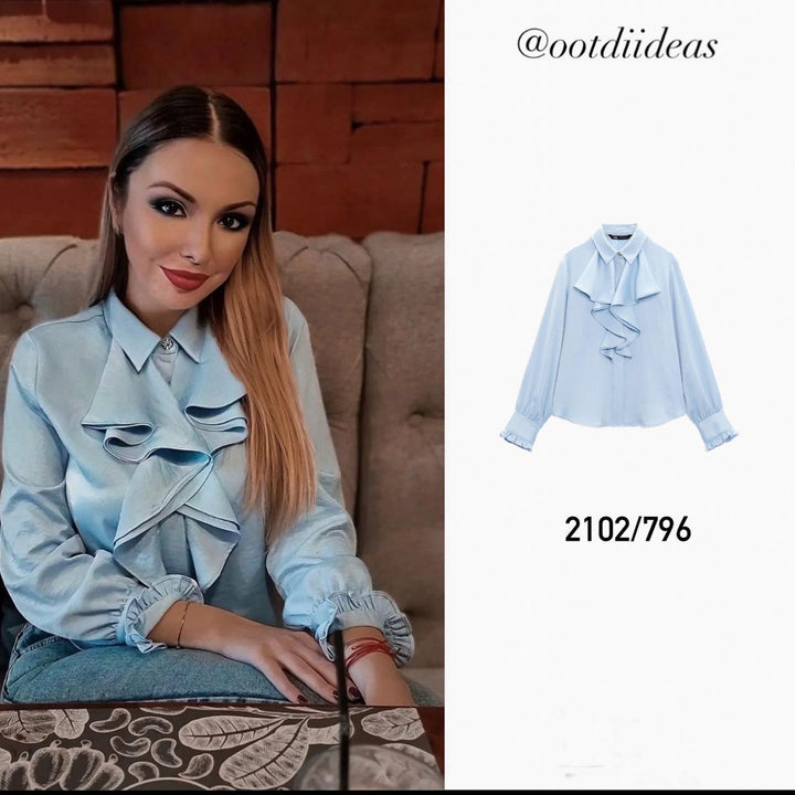 Damebluse med voluminøse flæser og elegant snit Stilla