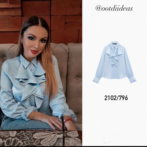 Damebluse med voluminøse flæser og elegant snit Stilla