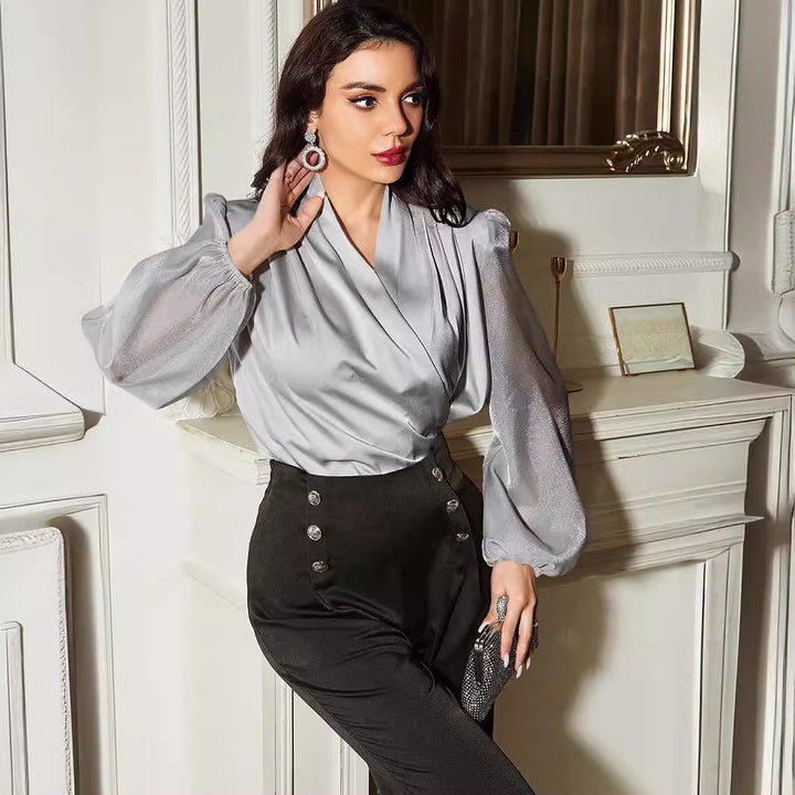 Damebluse med elegant vikleeffekt og gennemsigtige ærmer Stilla