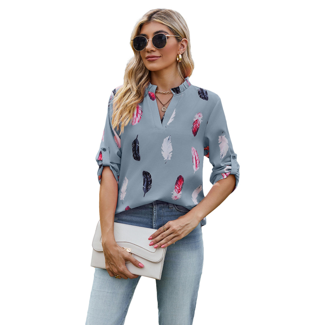 Damebluse med elegant fjerdesign og halvlange ærmer Stilla