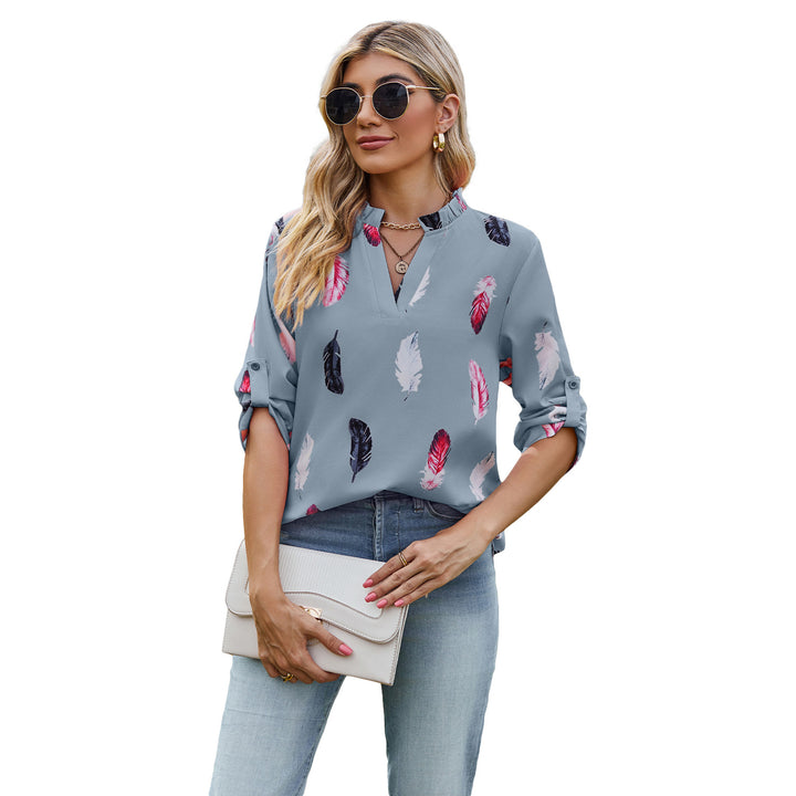Damebluse med elegant fjerdesign og halvlange ærmer Stilla
