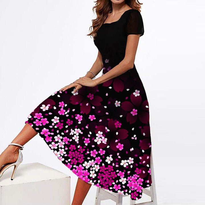 Dame Elegant Maxikjole med blomsterdesign og transparente ærmer Stilla